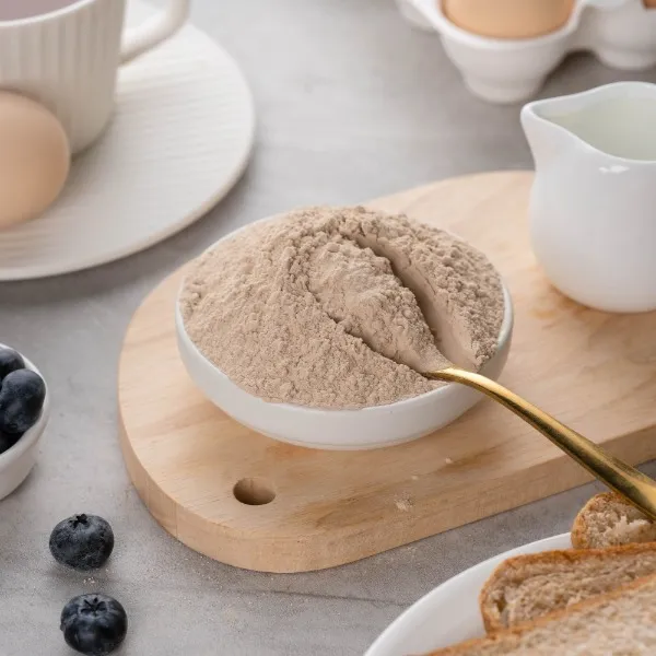 A bowl of beta-glucan and a tablespoon of beta-glucan