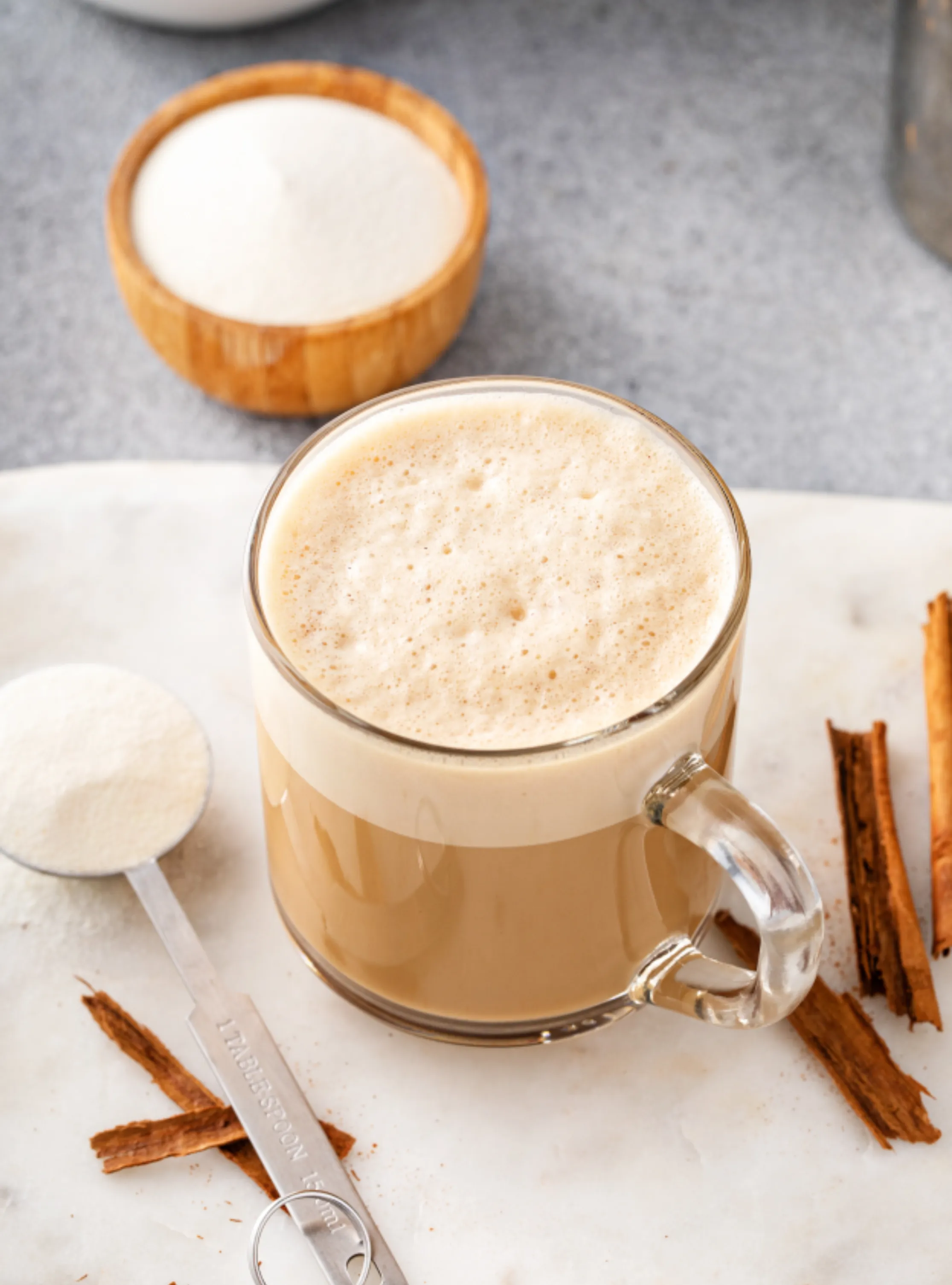 A spoonful of collagen powder, A bowl of collagen powder and collagen drink.